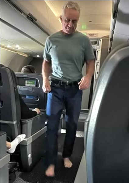 RFK Jr barefoot in airplane aisle